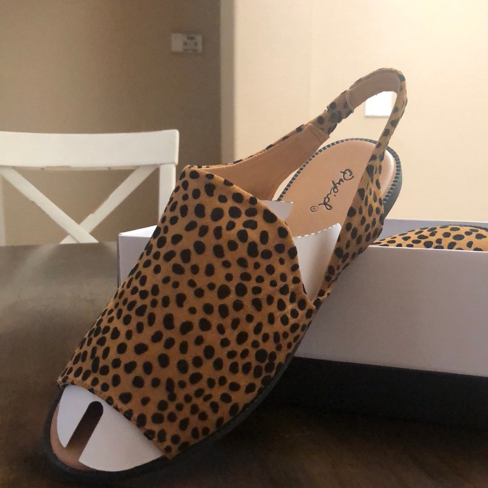 Beautiful animal print sandals with back strap.